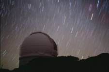 Star trails and INT dome La Palma by Ian King